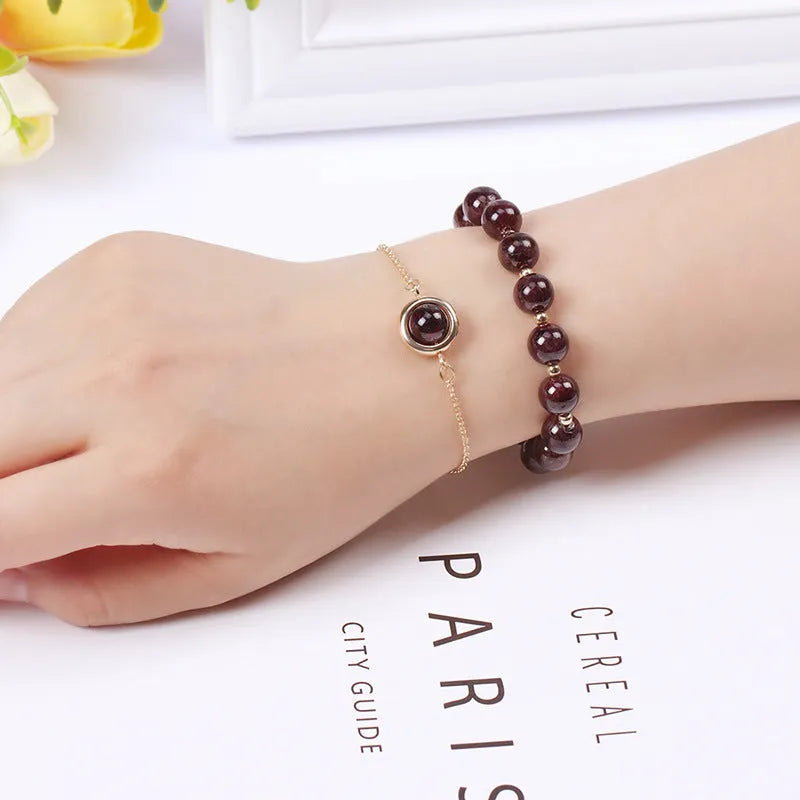 Double-layer women's bracelet with crystal beads and lucky charms in gold electroplated finish