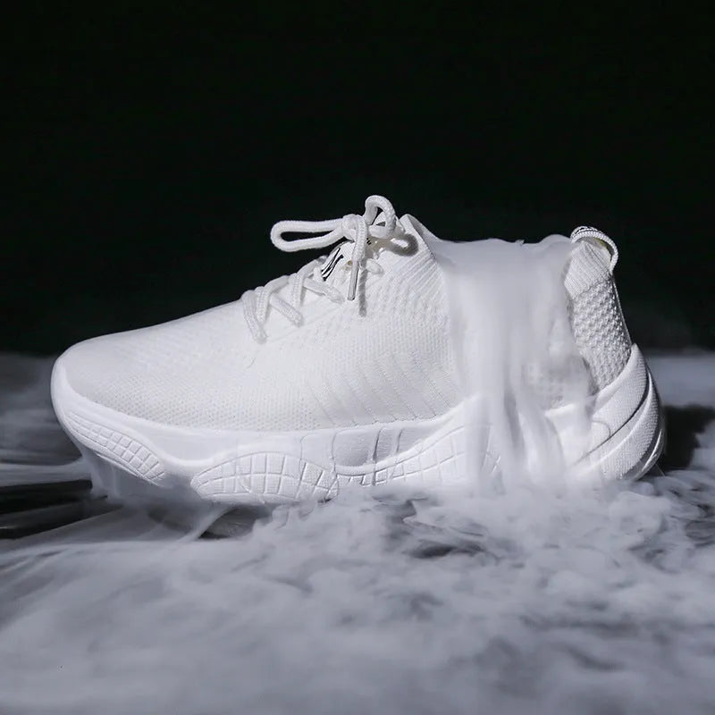 Women's white thick-soled flying woven trainers with pink perforations and a front strap on a rubber sole.