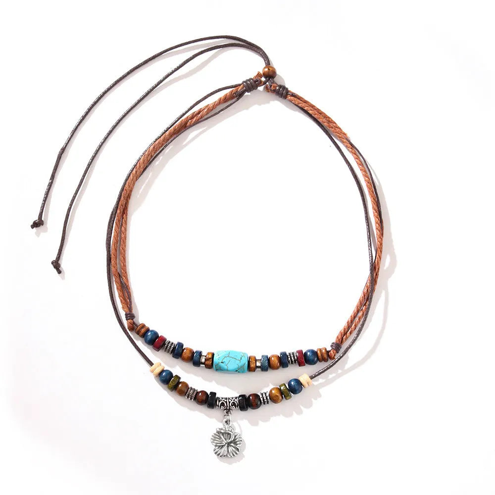 Men's retro wooden bead necklace with geometric alloy pendant and turquoise accents on wax rope cord.
