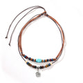 Men's retro wooden bead necklace with geometric alloy pendant and turquoise accents on wax rope cord.