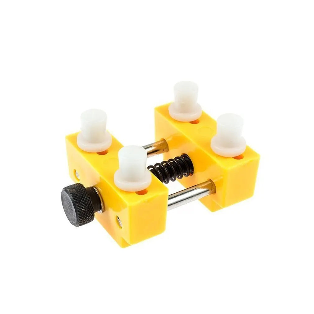 Yellow plastic watch repair kit with adjustable opener tool and fixing base