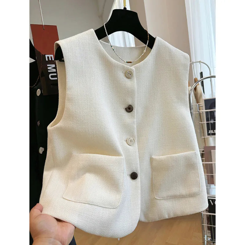Women's sleeveless polyester bandage vest dress with round neck in milky white.