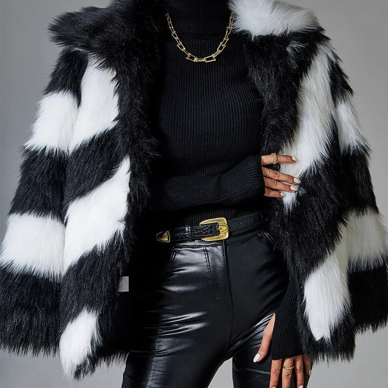 Women's faux fur coat with contrast colour lapel and matching fur collar on a model.