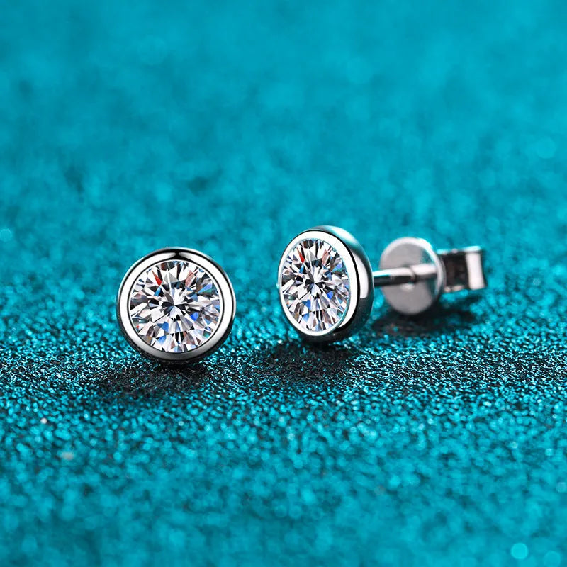Geometric gold plated women's earrings with a moissanite stone on a 925 silver setting.
