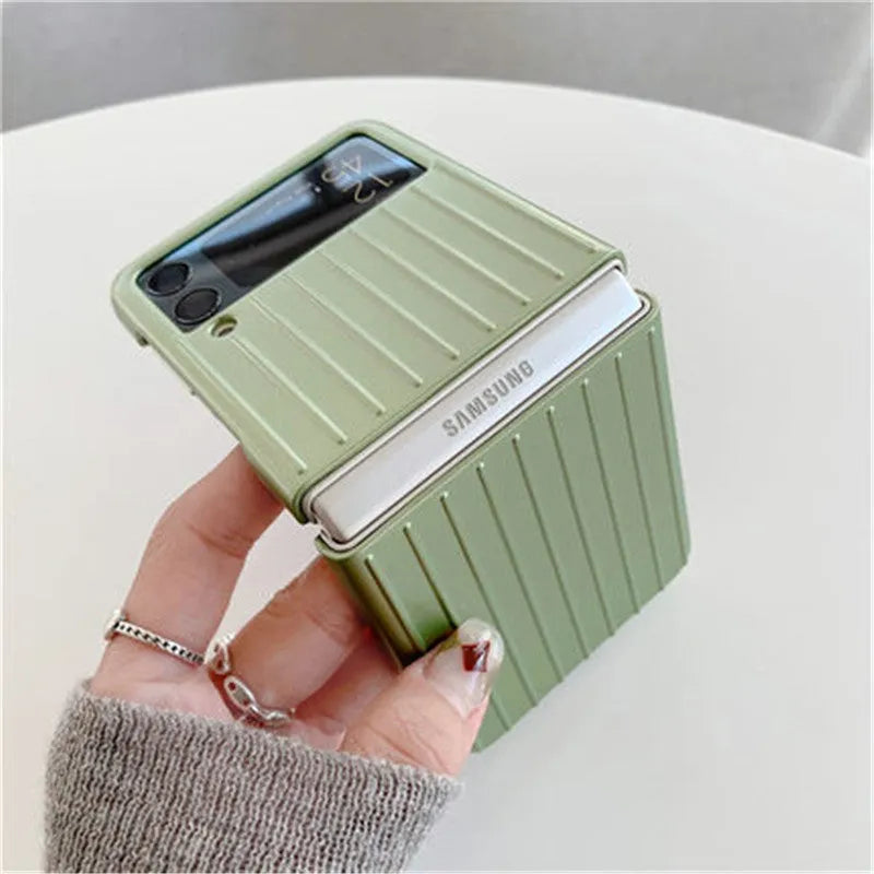 Samsung Z Flip3 folding phone in a slim, solid-colour flip case showing front and back views.
