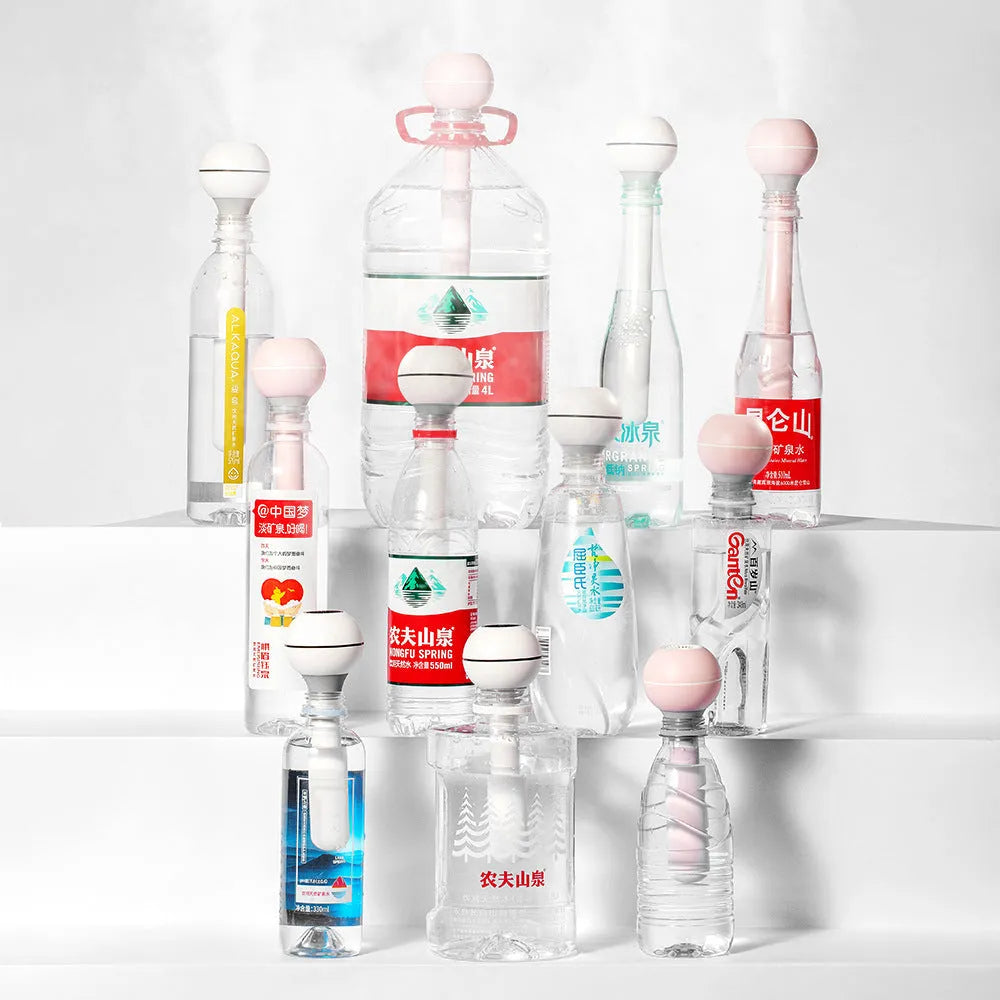 Magic wand ultrasonic humidifier with columnar design in pink and white colour options