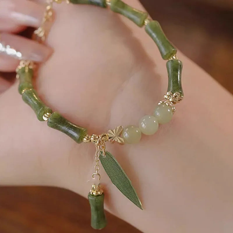 Chinese style glass bracelet with bamboo joint design elements in multiple colour options