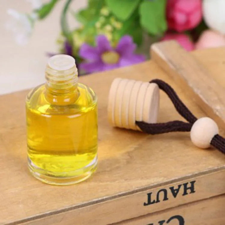 Glass bottle car air freshener hanging ornament with choice of six 55g scents.