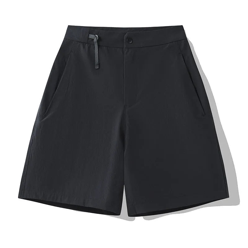 Men's quick-drying sports shorts in khaki colour with a four-sided elastic waistband, shown flat.
