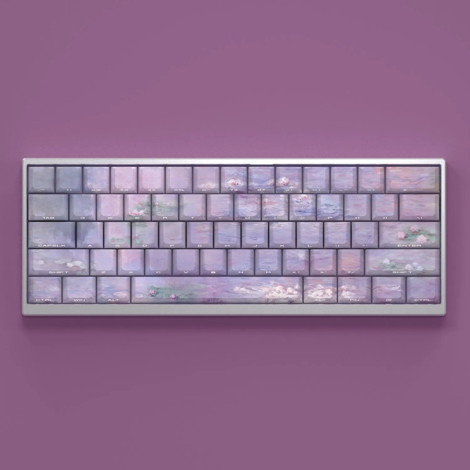 Set of white PBT keycaps with colourful water lily design on top and sides, showing side-engraved transparent characters.