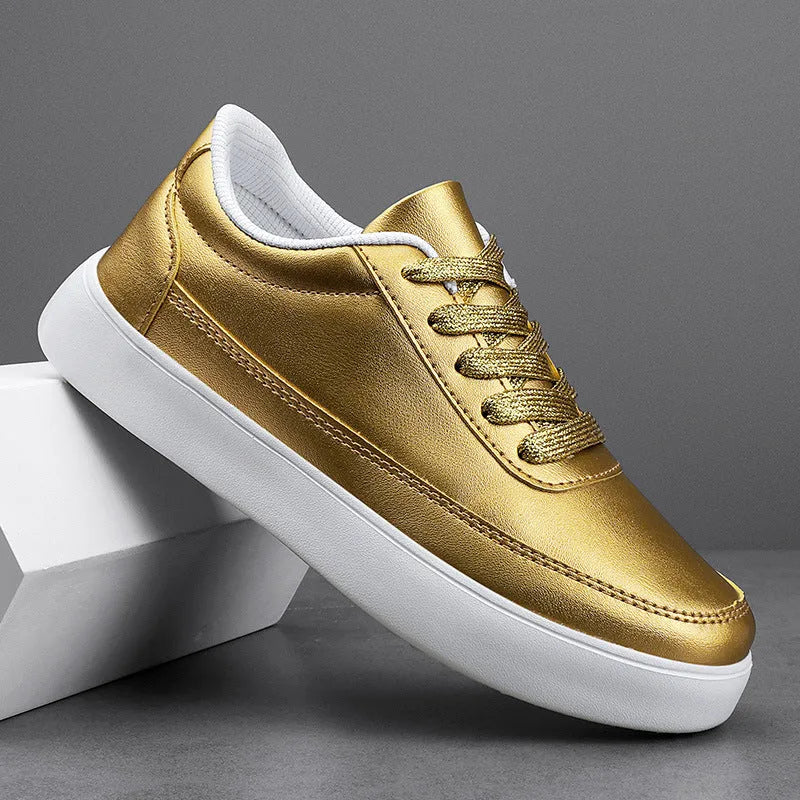 Women's white leather lace-up flat casual shoes on a solid background.