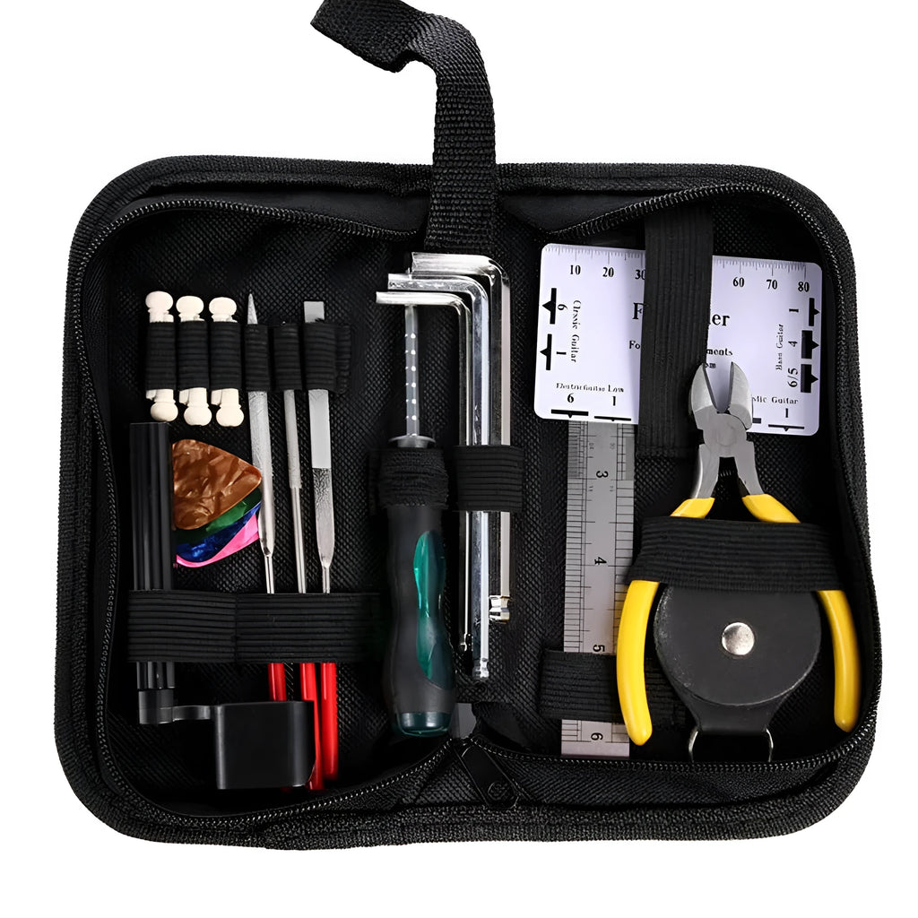 Black guitar repair tool kit open to show tools, next to an acoustic guitar.