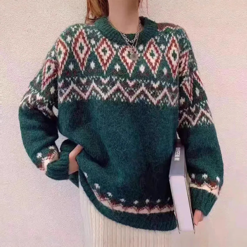 Red and white striped loose retro pullover knitted top on a hanger.