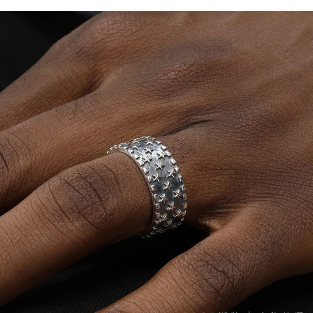 925 silver adjustable ring with geometric five-pointed star pattern.