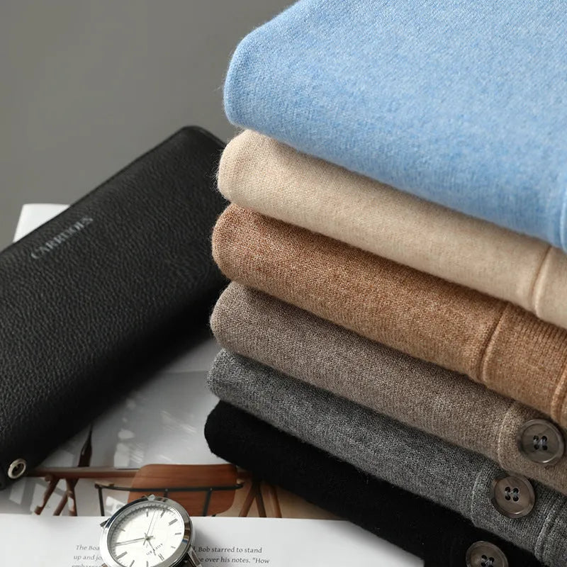 Man wearing a beige V-neck Andy velvet cardigan coat with long sleeves