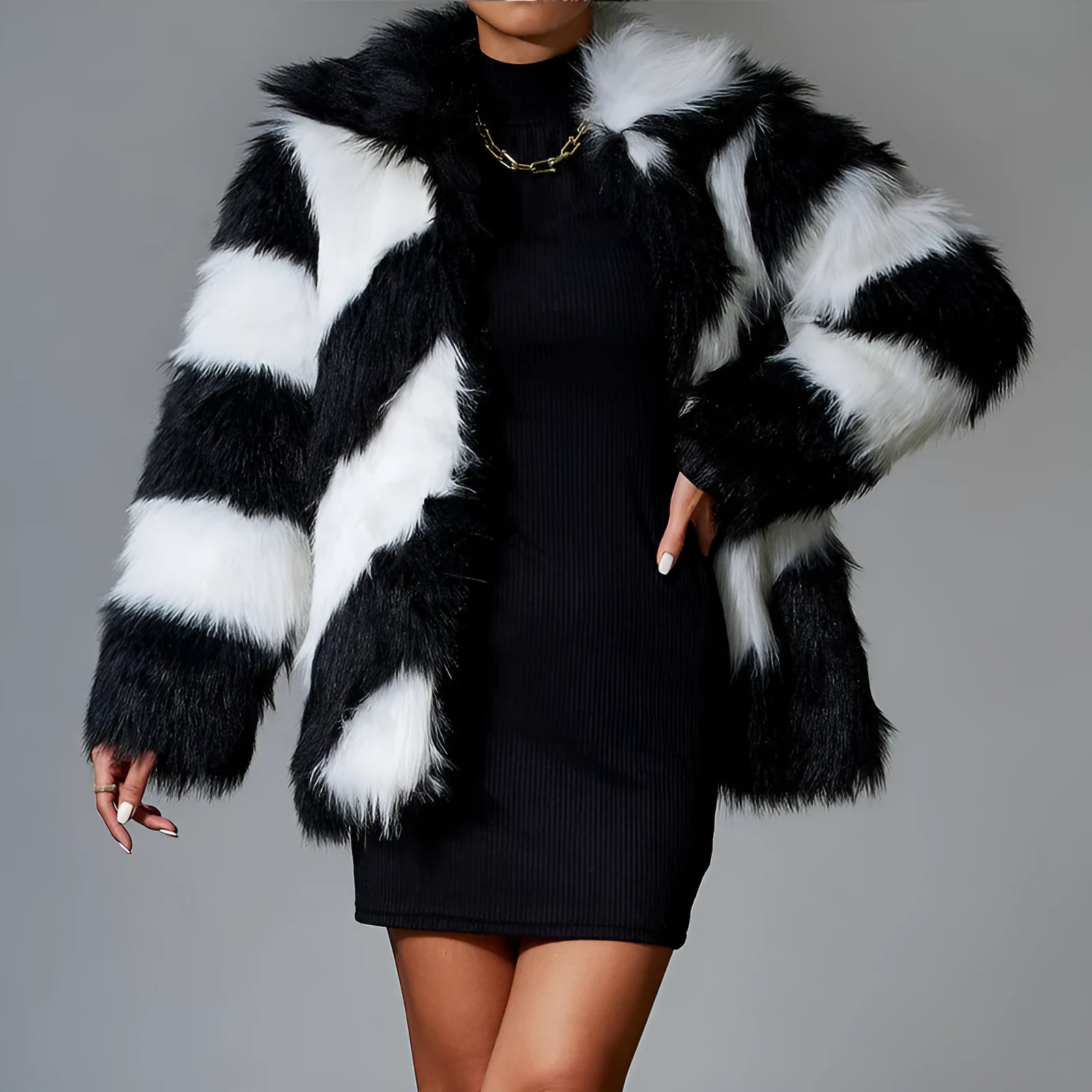 Women's faux fur coat with contrast colour lapel and matching fur collar on a model.