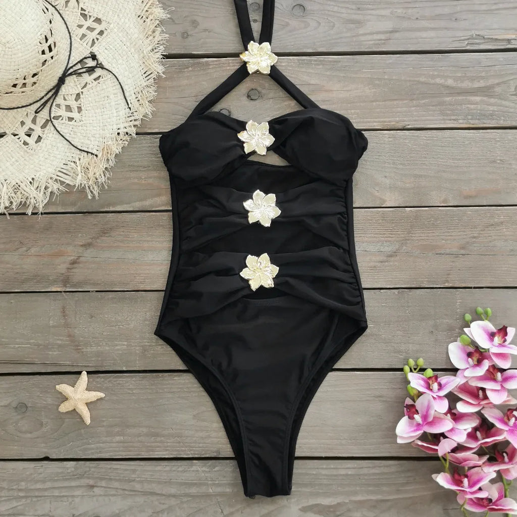 Women's solid colour one-piece swimsuit with hollow out tube top and matching short skirt.