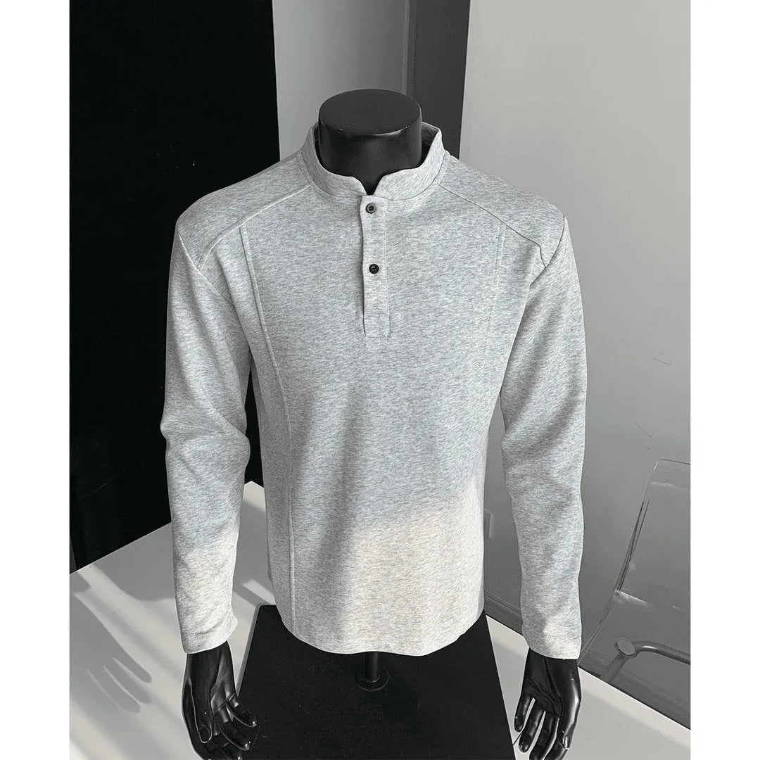 Men's loose-fitting asymmetric patchwork polo shirt with a stand-up collar and long sleeves in grey.