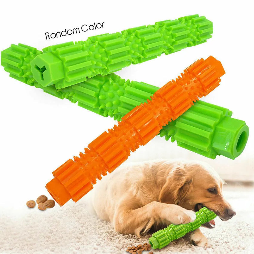Green and orange rubber dog chew toy with treat dispensing design and textured surface
