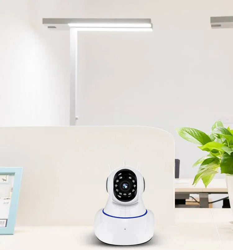 White dome-style wireless HD security camera for indoor and outdoor use.