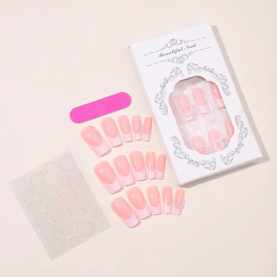 French Love Pearl removable fake nail stickers kit showing nail strips, jelly glue pot, and polish rub in colour XD93.