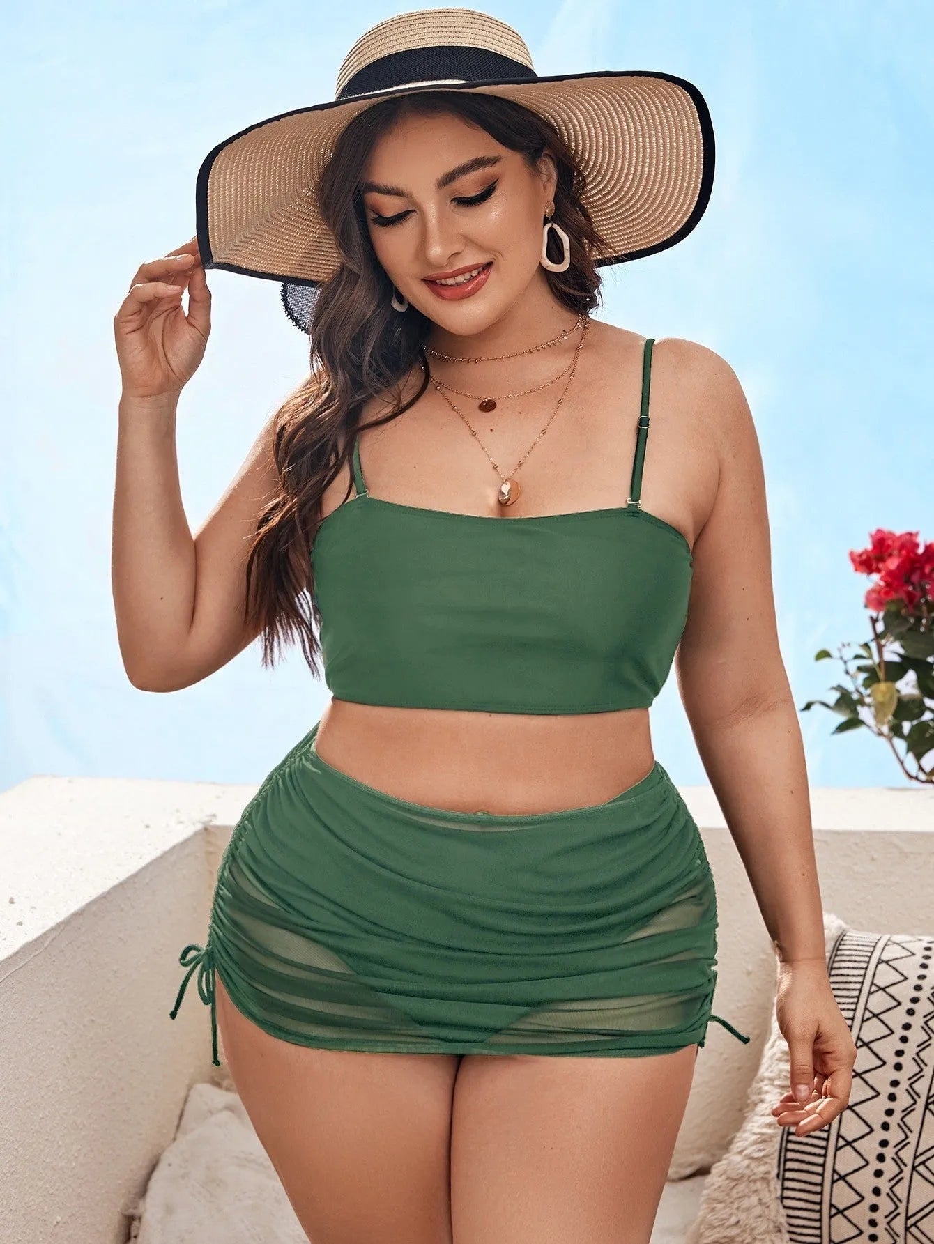 Women's solid colour mesh bikini three-piece set showing top, underwear, and apron on a mannequin.