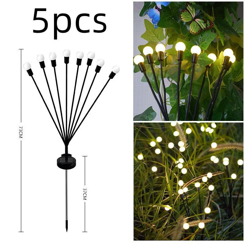Solar-powered LED garden light with multiple heads on stainless steel ground spikes
