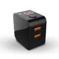 Black dual USB fast charger with digital display showing charging current, plugged into a UK wall socket.