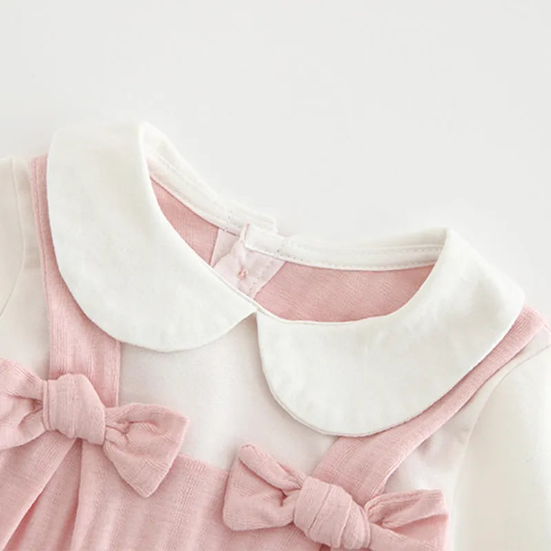 Pink long sleeve cotton jumpsuit for baby girl with single-breasted buttons