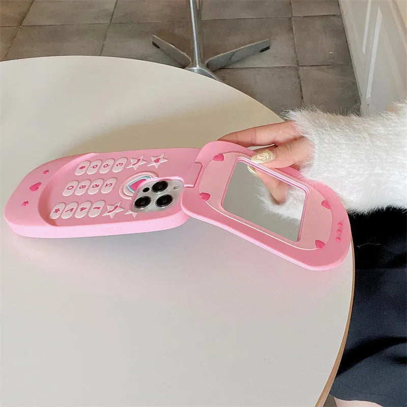 Light pink silicone flip phone case with a built-in mirror, shown next to a rose red version.