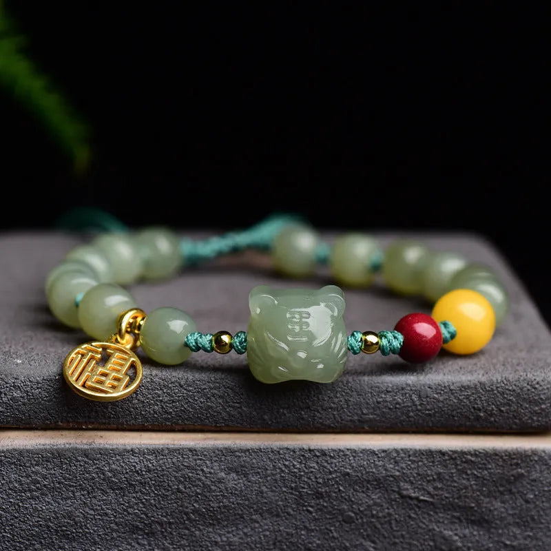 Natural Hetian jade bracelet with red cinnabar and amber beeswax beads, animal zodiac design