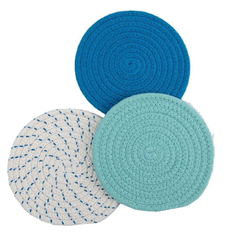 Three round 18cm cotton cord coaster placemats in modern minimalist design