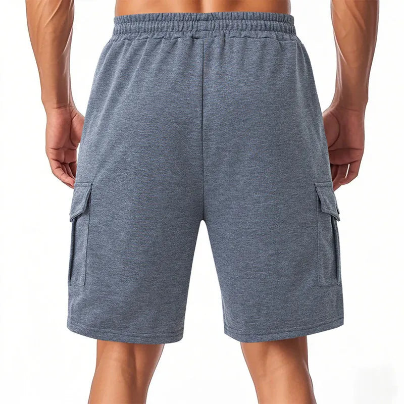 Men's light grey loose fit cargo shorts with multiple pockets and elastic waistband