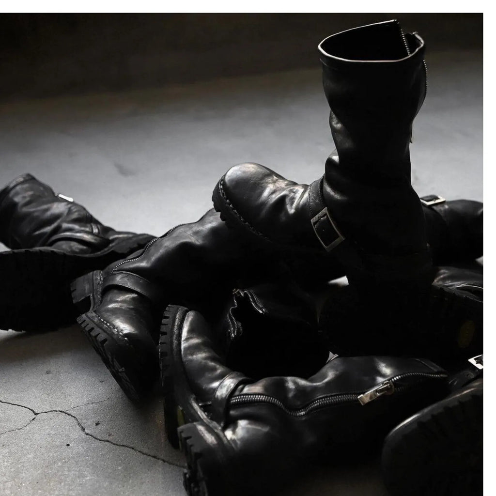 Men's black retro Martin ankle boots with a side zip closure and round toe.