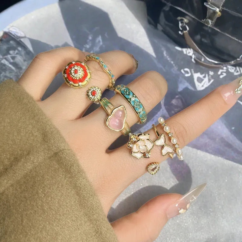 Adjustable copper gourd ring with vintage oil-drip finish and zircon inlay.