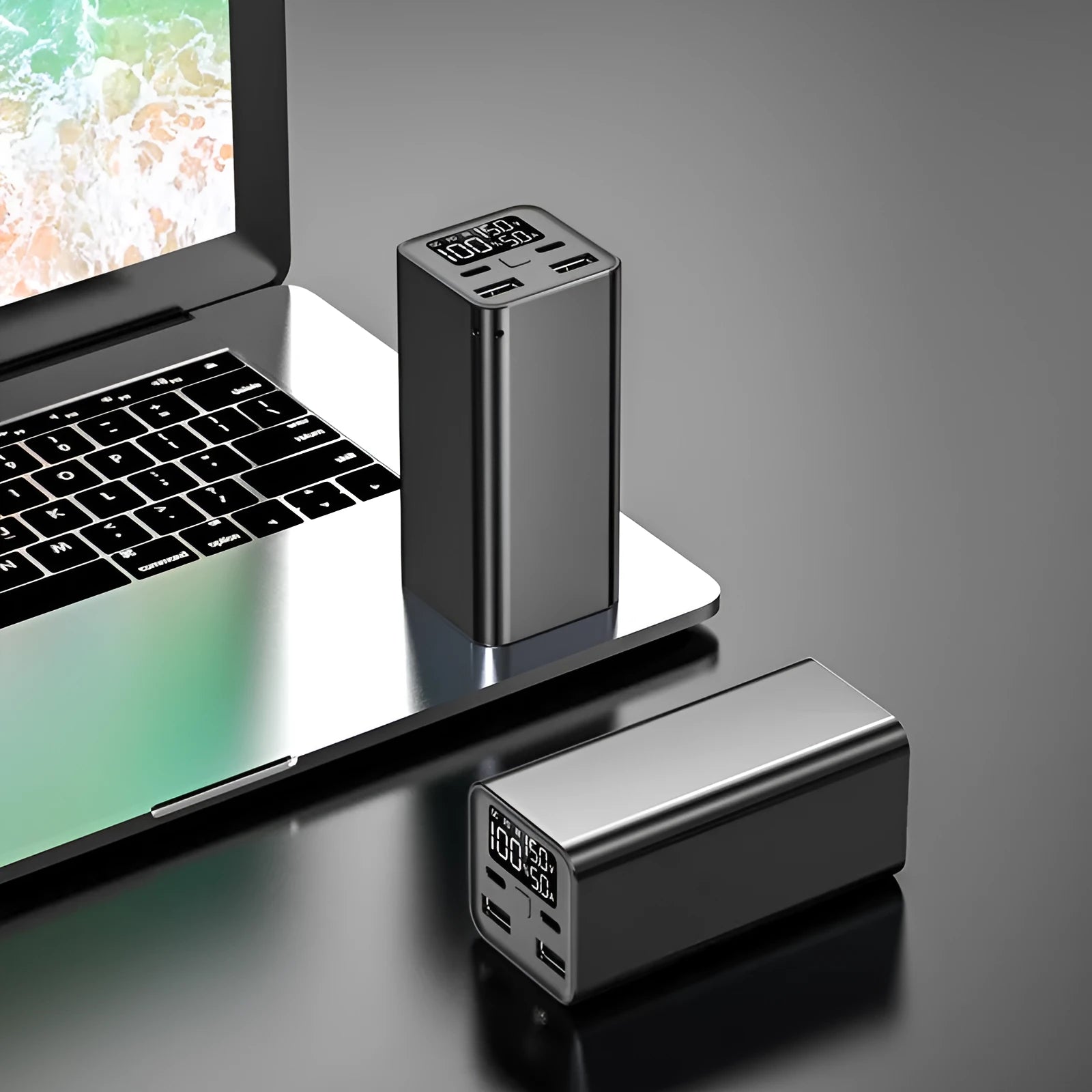 Black high-power 65W metal charging bank with 20000mAh capacity for laptop fast charging.