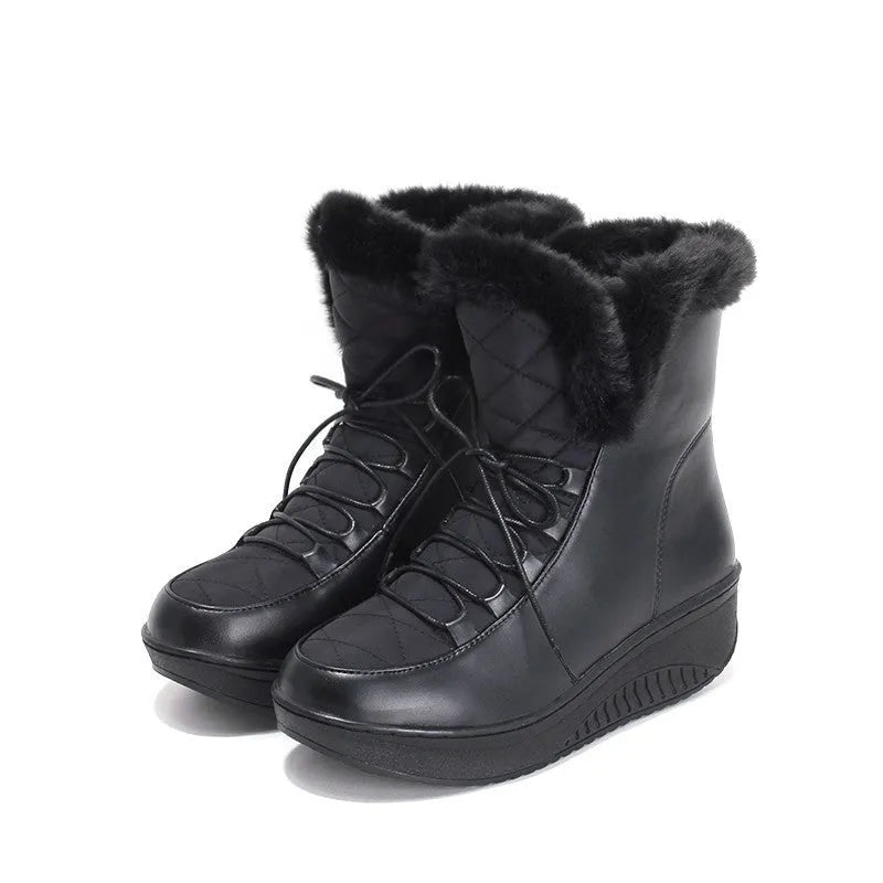 Black women's winter boots with lace-up front, platform sole, and plush lining.