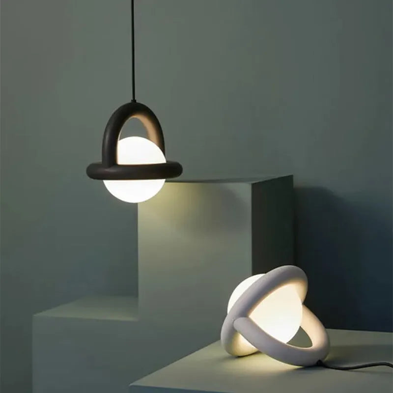 Danish designer hanging line pendant lamp in matte black mounted on a wall