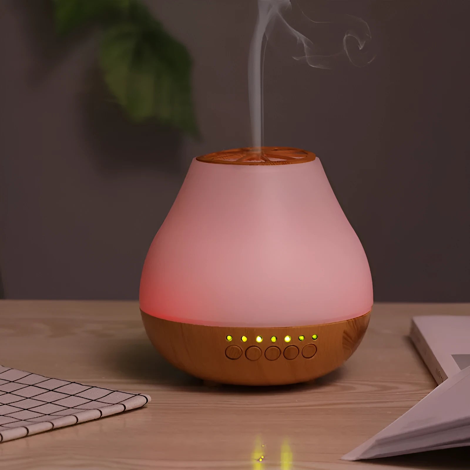 USB essential oil diffuser with wood grain finish and colourful LED mood lighting