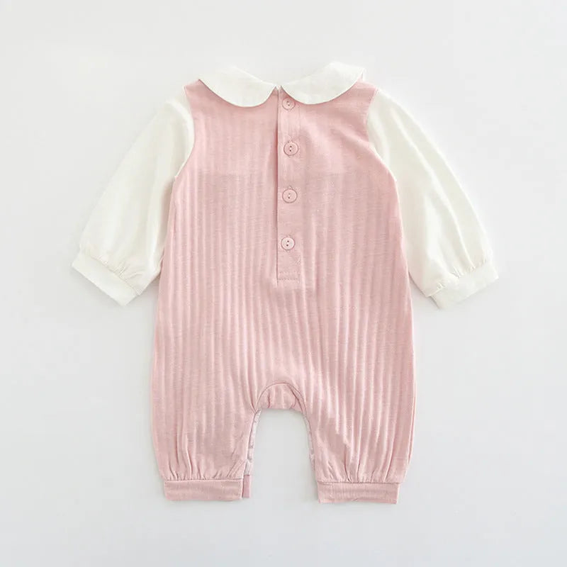 Pink long sleeve cotton jumpsuit for baby girl with single-breasted buttons