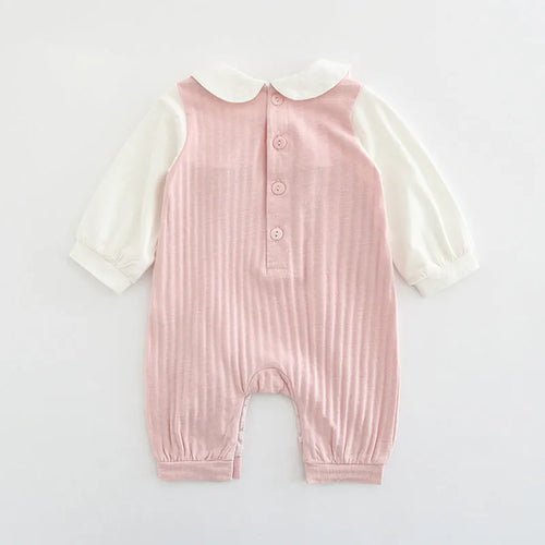Pink long sleeve cotton jumpsuit for baby girl with single-breasted buttons