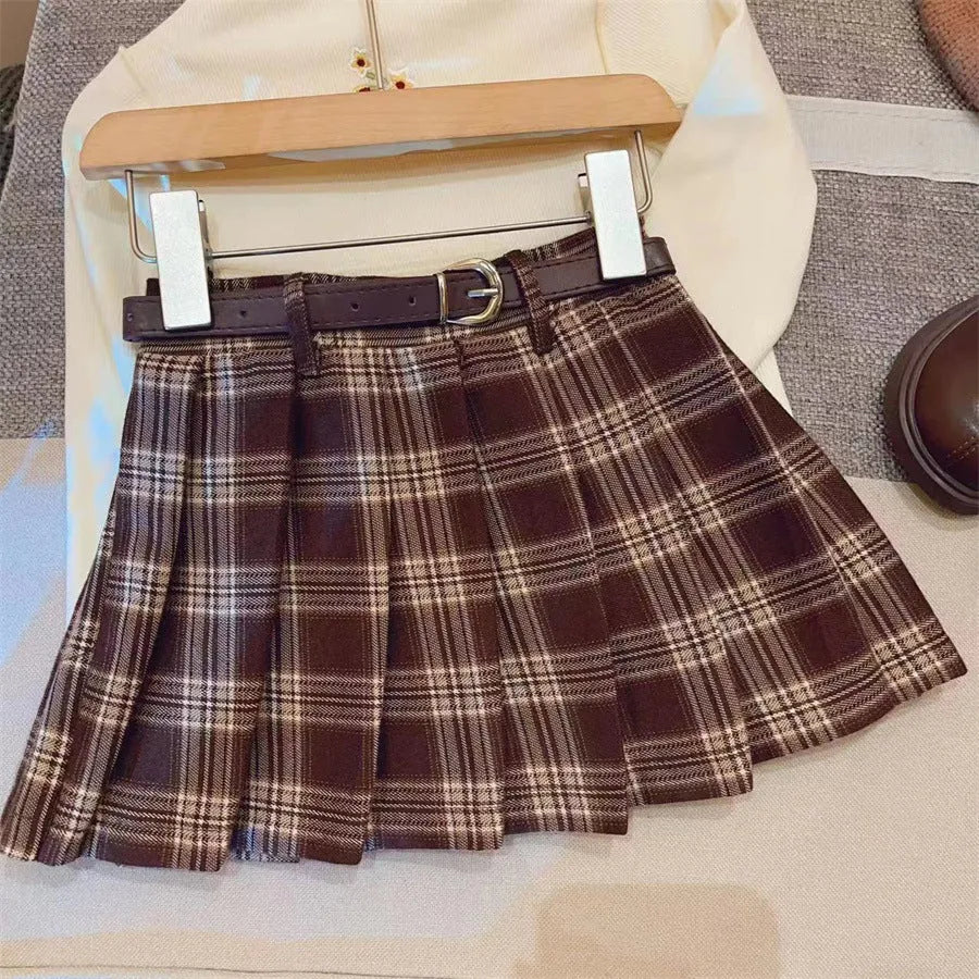 Children's cotton plaid pleated skirt with A-line silhouette shown on mannequin