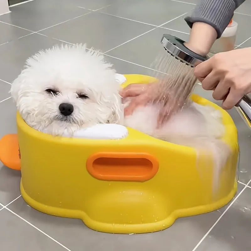 Blue PVC duck-shaped bathtub for washing a small dog or cat, a non-electric portable pet washing tub.