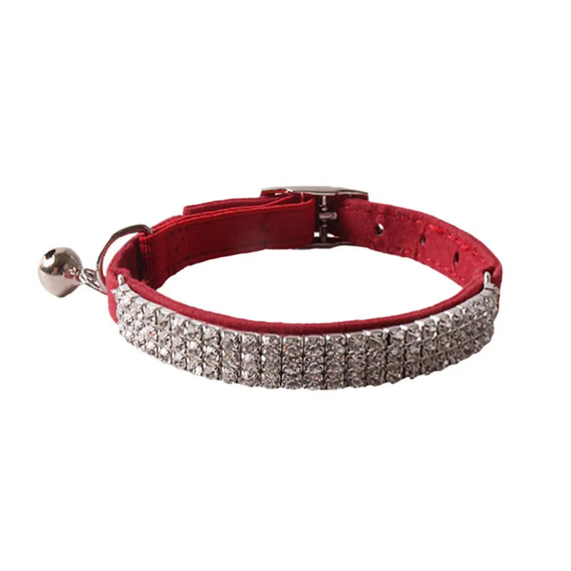 Colourful flannel-pattern cat collar with elastic buckle on a white background.
