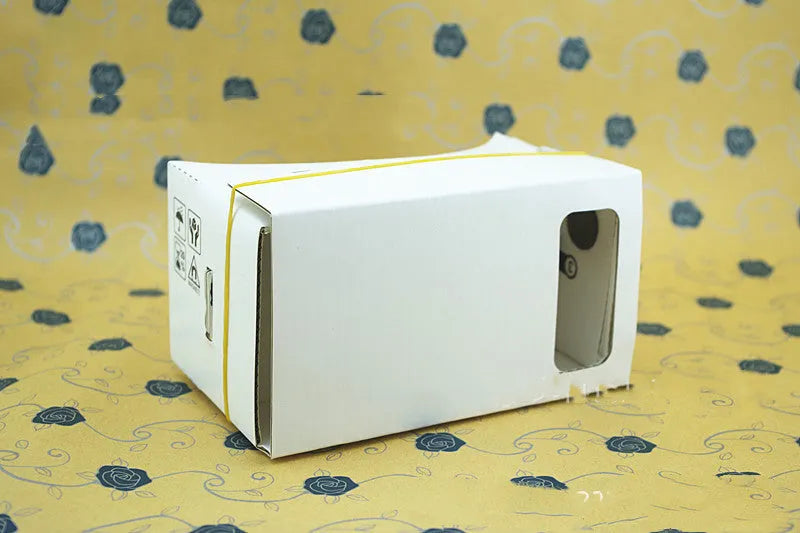 Pink and white VR cardboard glasses for smartphones with 3D lenses