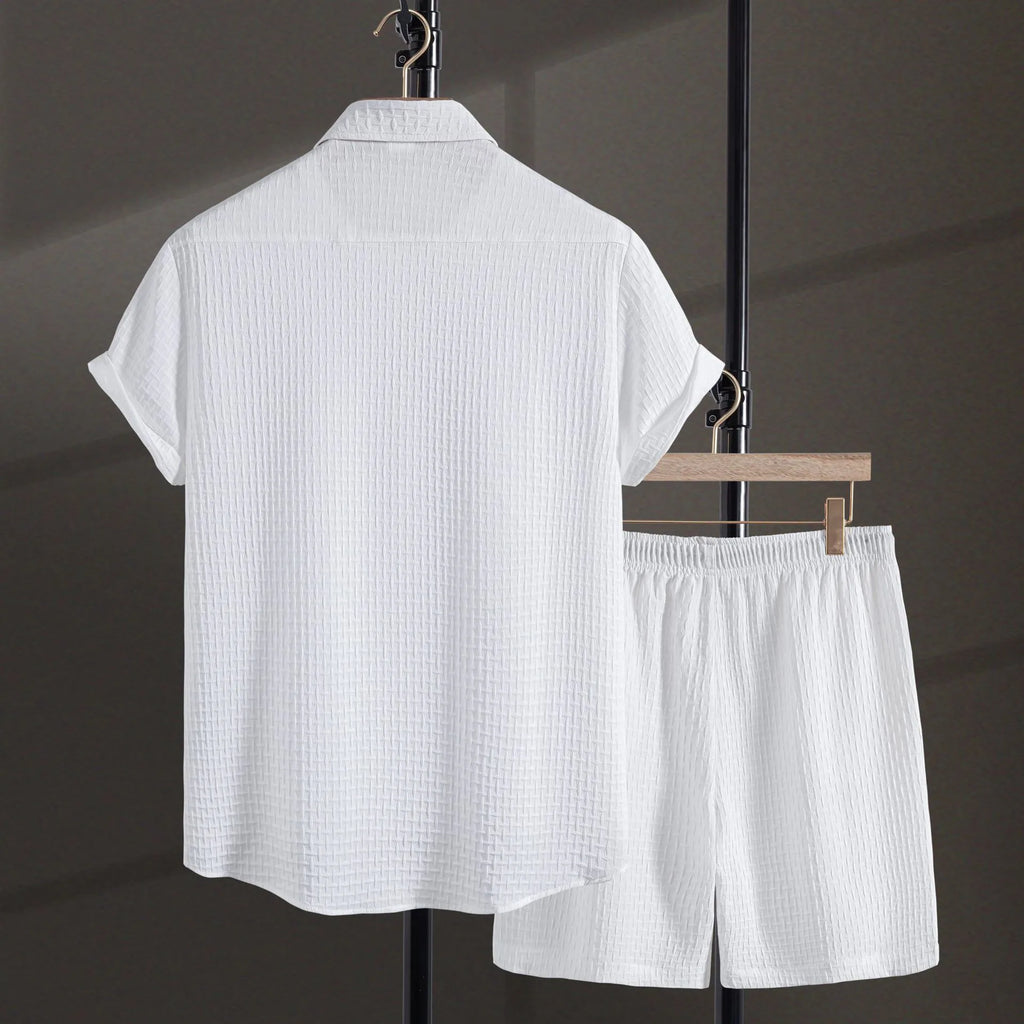 Men's casual cotton blend beach shorts suit in black, showing short sleeve shirt and matching shorts.