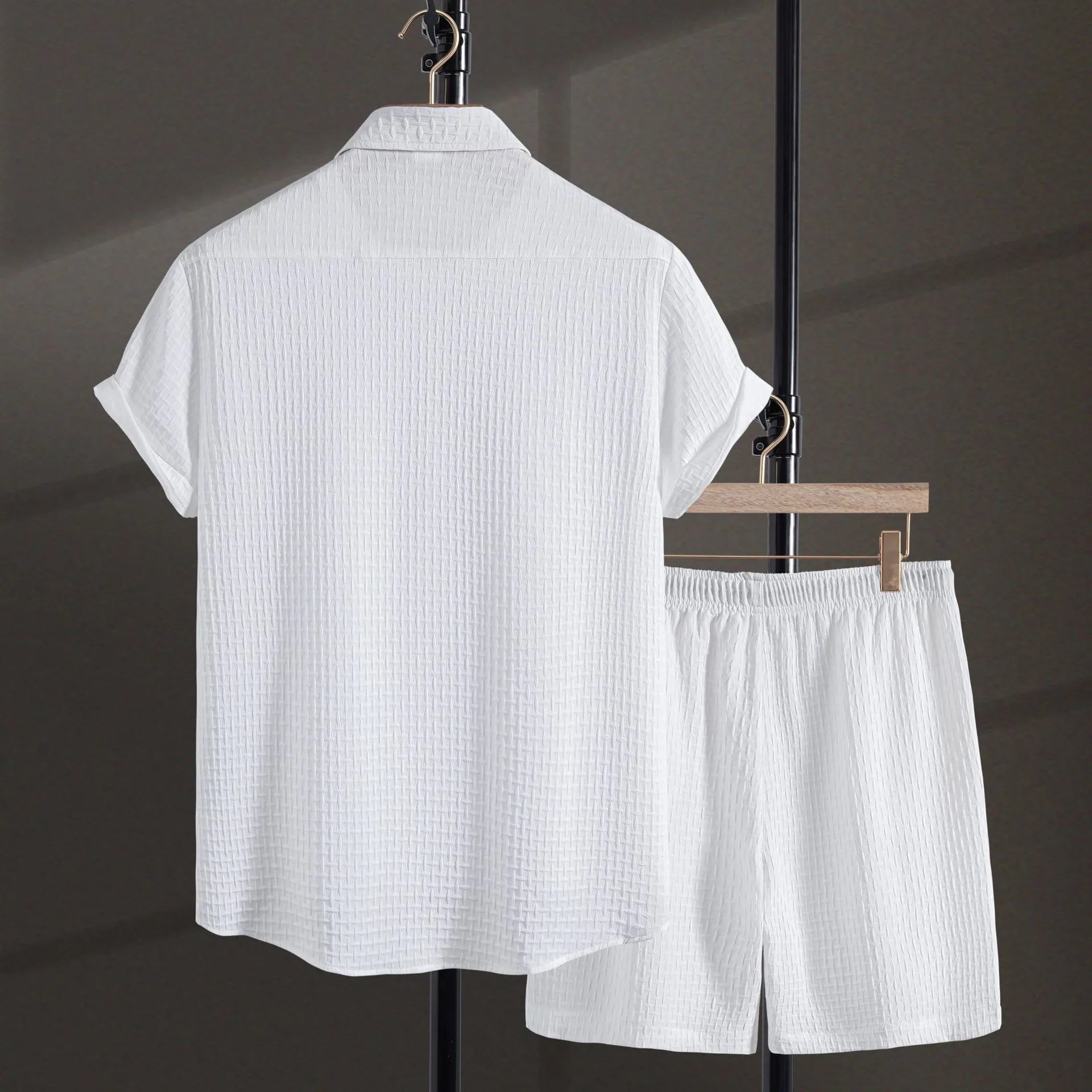 Men's casual cotton blend beach shorts suit in black, showing short sleeve shirt and matching shorts.