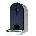 Automatic pet feeder with remote monitoring in Barbie pink and ivory white colours
