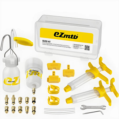 EZmtb bicycle hydraulic brake bleed kit with syringes, bottles, hoses, and metal adapters on a workbench.