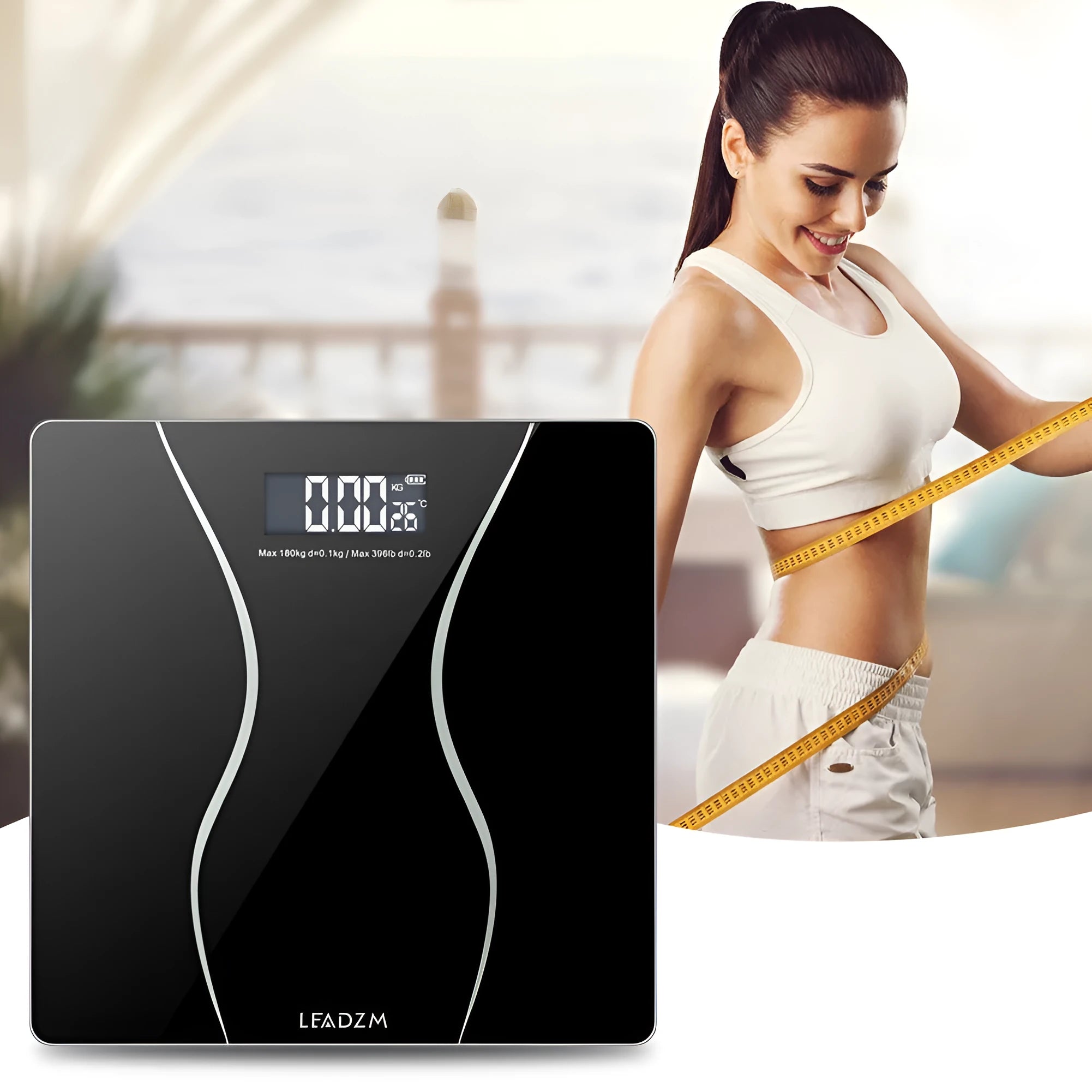 Black electronic household bathroom scale on a floor.